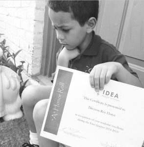 Le Penseur; Dre with his first IDEA academic award. 