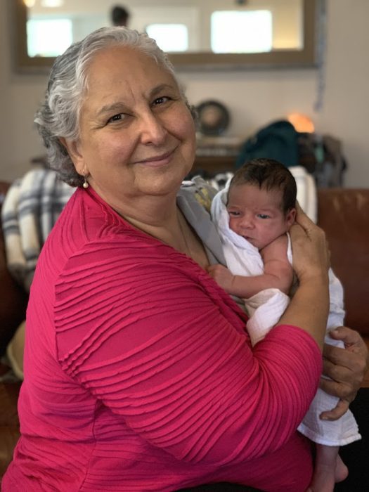 The author's mother holds her baby son, only a few weeks old.